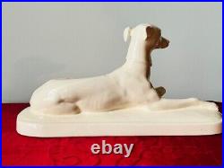 Art Deco Sculpture Elegant White Faience of a Resting Greyhound, Signed 20th C