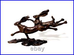 Solid Bronze Graceful Leaping Hares